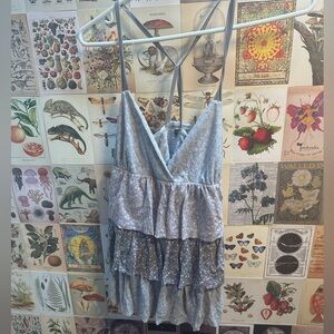 American Eagle tank top. Ruffled, criss cross back. In great condition. Size med